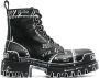 Balenciaga graphic-print leather combat boots Black - Thumbnail 1