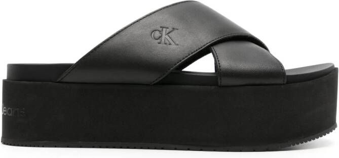 Calvin Klein Jeans logo-debossed flatform slides Black