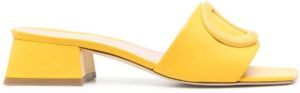 Dee Ocleppo Dizzy logo-buckle mules Yellow