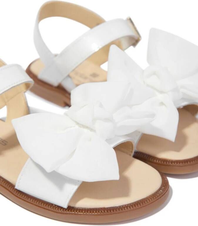 ANDANINES bow-embellished leather sandals White