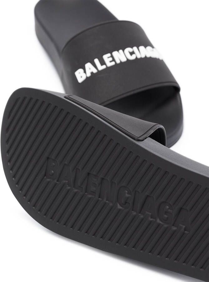 Balenciaga logo-embossed pool slides Black