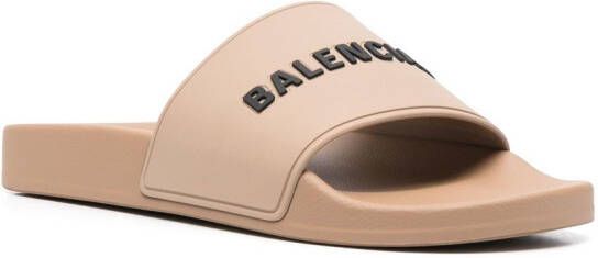 Balenciaga logo-embossed pool slides Neutrals