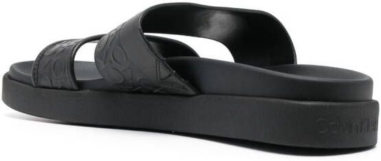 Calvin Klein embossed-logo leather slides Black