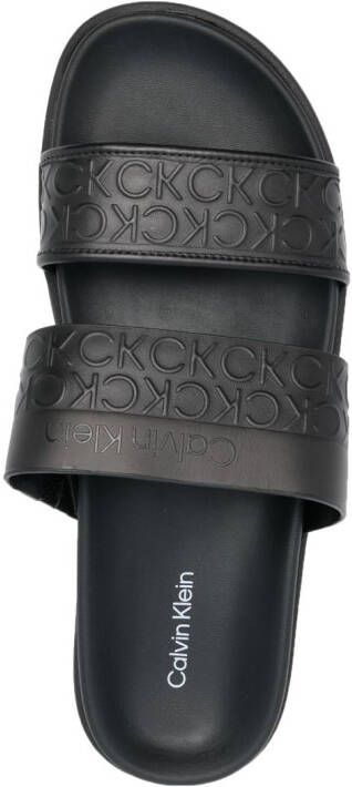 Calvin Klein embossed-logo leather slides Black