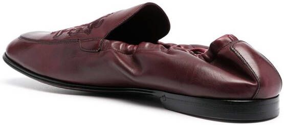 Dolce & Gabbana debossed-motif polished-finish loafers Red