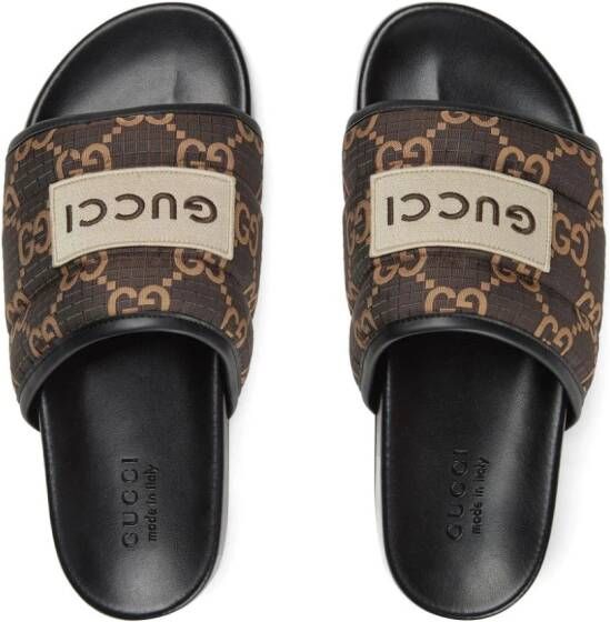 Gucci GG Supreme quilted slides Brown