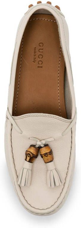 Gucci pebbled tassel loafers White