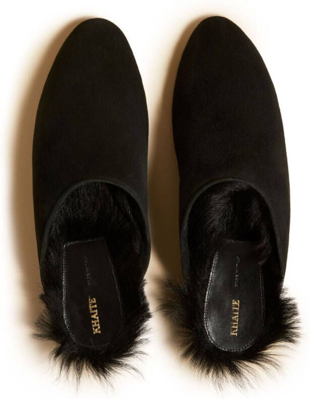 KHAITE The Otto shearling-lined suede mules Black