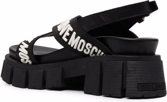 Love Moschino crossover logo strap sandals Black