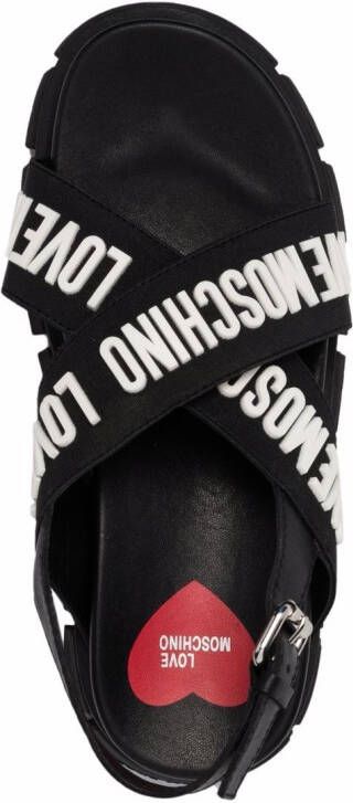 Love Moschino crossover logo strap sandals Black