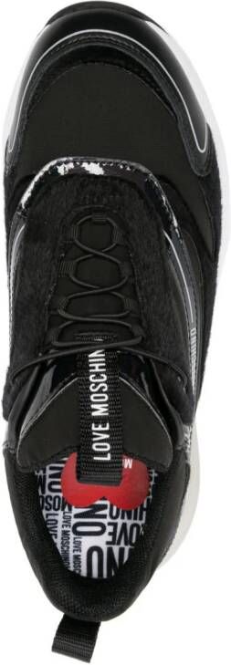 Love Moschino faux-shearling trim panelled sneakers Black