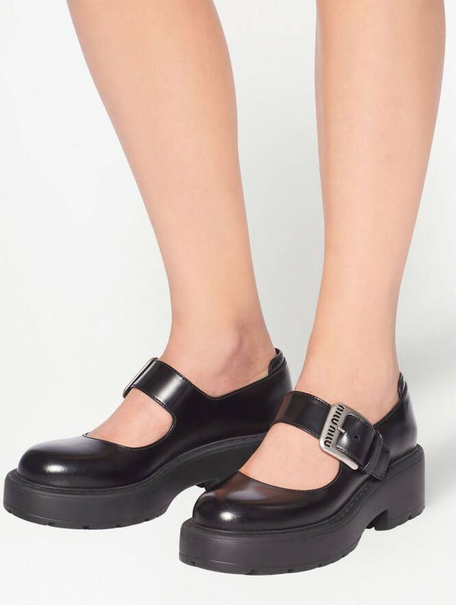 Miu chunky buckle-fastening loafers Black