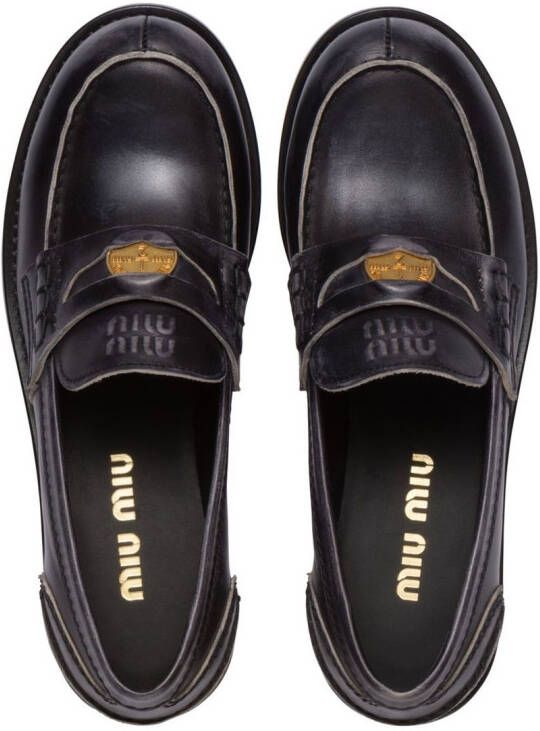 Miu logo-plaque leather loafers Black