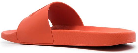 Moncler logo-embossed slides Orange