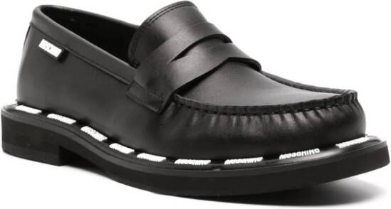 Moschino contrasting logo-trim loafers Black