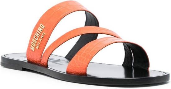 Moschino crocodile crossover strap sandals Orange