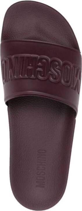 Moschino embossed-logo sliders Purple