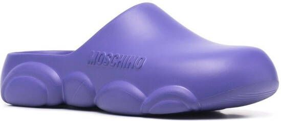 Moschino logo embossed mules Purple