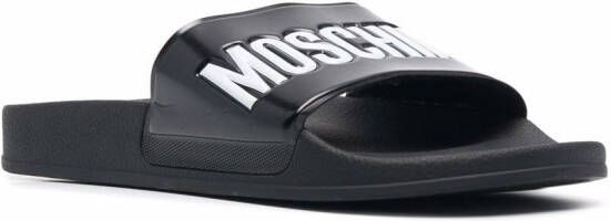 Moschino logo embossed slides Black