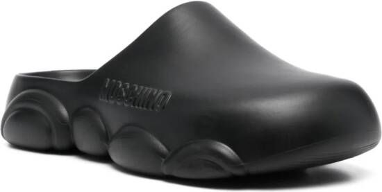 Moschino logo-embossed slip-on clogs Black