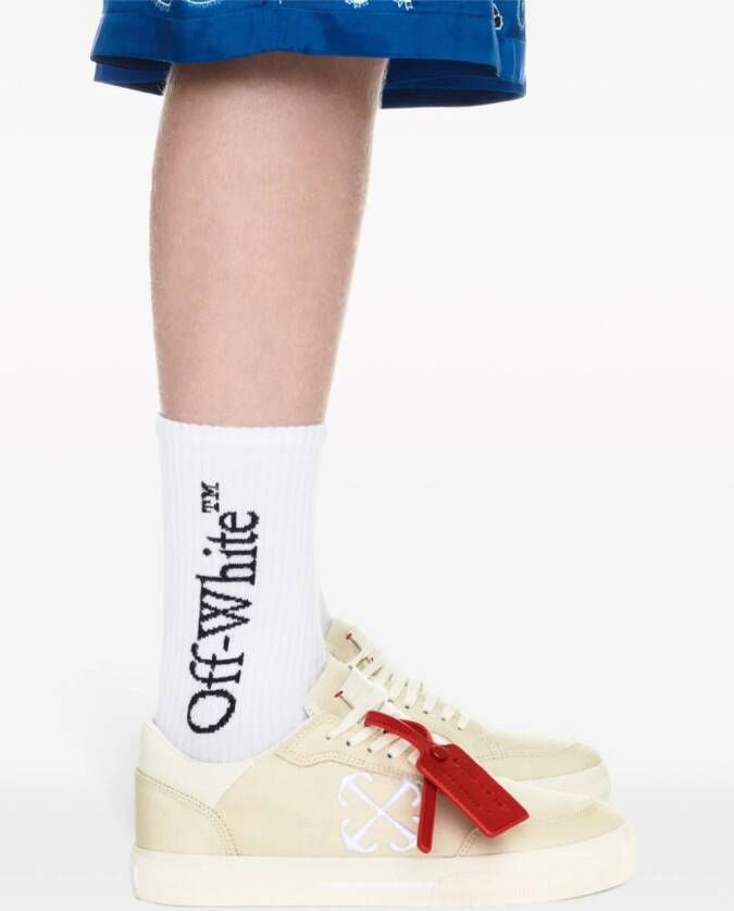 Off-White Vulcanized contrasting-tag canvas sneakers Neutrals