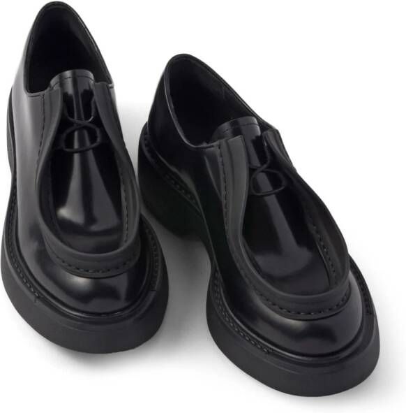 Prada raised-edge leather lace-up shoes Black