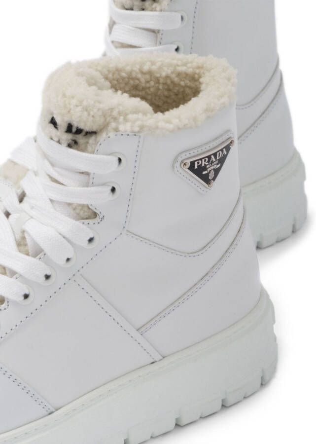 Prada triangle-logo high-top leather sneakers White