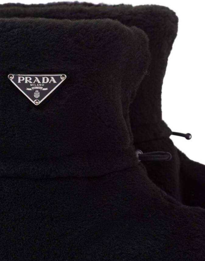 Prada triangle logo-appliqué shearling boots Black