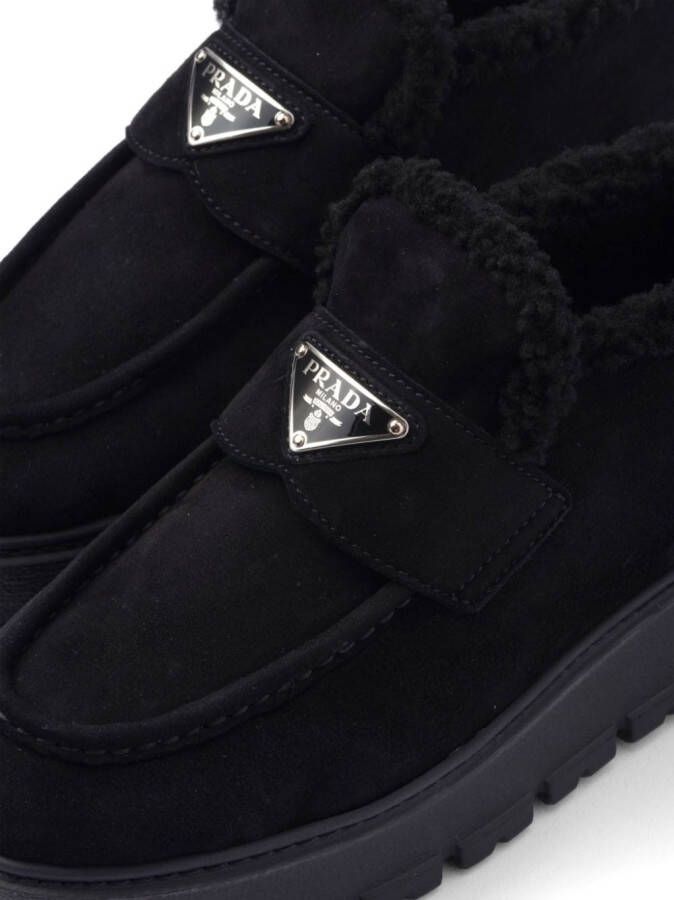 Prada triangle-logo shearling loafers Black