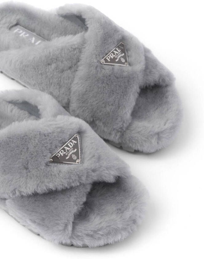 Prada triangle-logo shearling slippers Grey