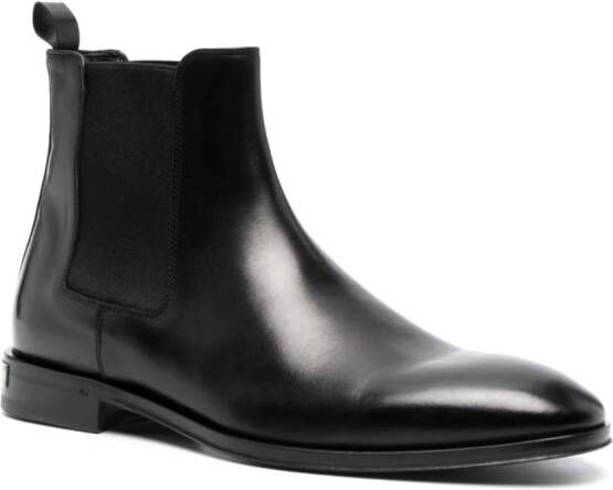 Roberto Cavalli engraved-logo leather boots Black