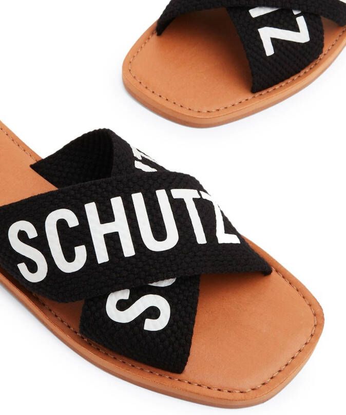 Schutz logo-print flat leather slides Black