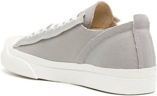 Undercover logo-print low-top sneakers Grey