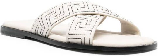 Versace Greca-embossed crossover-strap sandals Neutrals