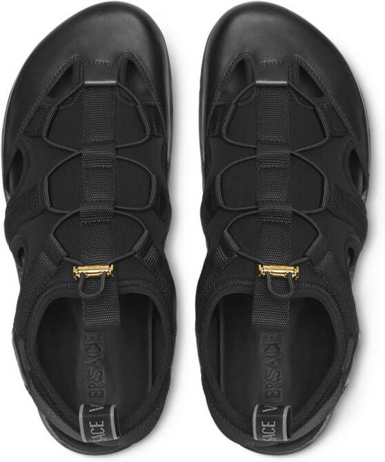 Versace logo-debossed caged sandals Black