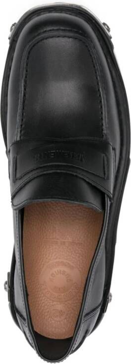 VETEMENTS logo-embossed leather loafers Black