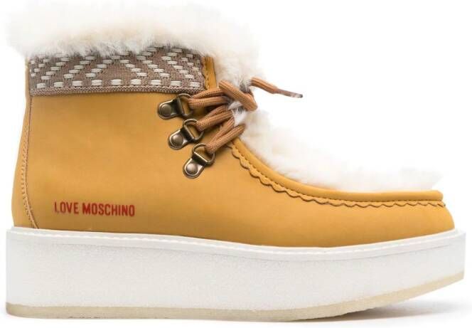 Love Moschino embossed-logo faux-fur ankle boots Neutrals