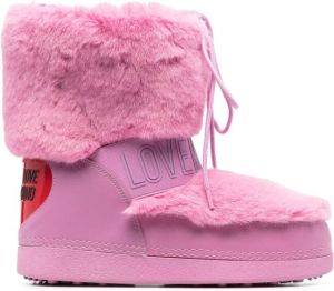 Love Moschino embossed-logo faw-fur boots Pink