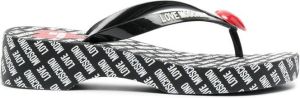 Love Moschino logo-print flip flops Black