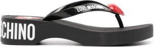 Love Moschino logo-print flip flops Black