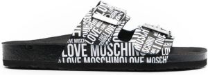 Love Moschino repeat logo slides Black
