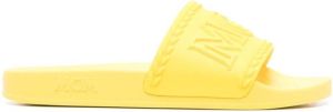 MCM embossed-logo flip flops Yellow