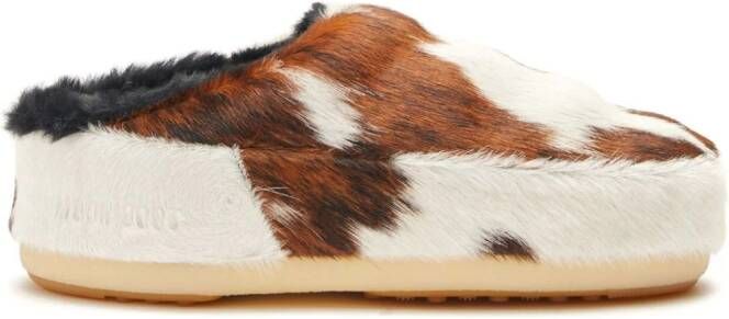 Moon Boot cow-print pony hair mules White