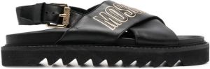 Moschino crossover logo-plaque sandals Black