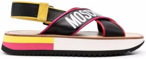 Moschino crossover logo-print leather sandals Black