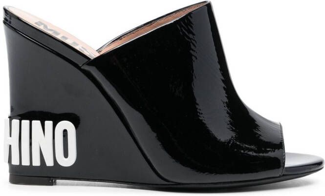 Moschino embossed-logo wedge mules Black