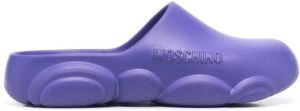 Moschino logo embossed mules Purple
