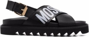 Moschino logo-print crossover strap sandals Black