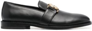 Moschino smiley-plaque detail loafers Black