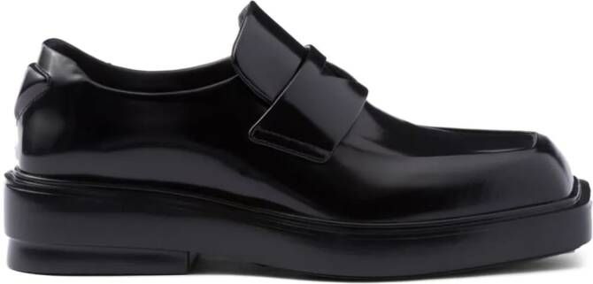 Prada triangle-patch leather loafers Black